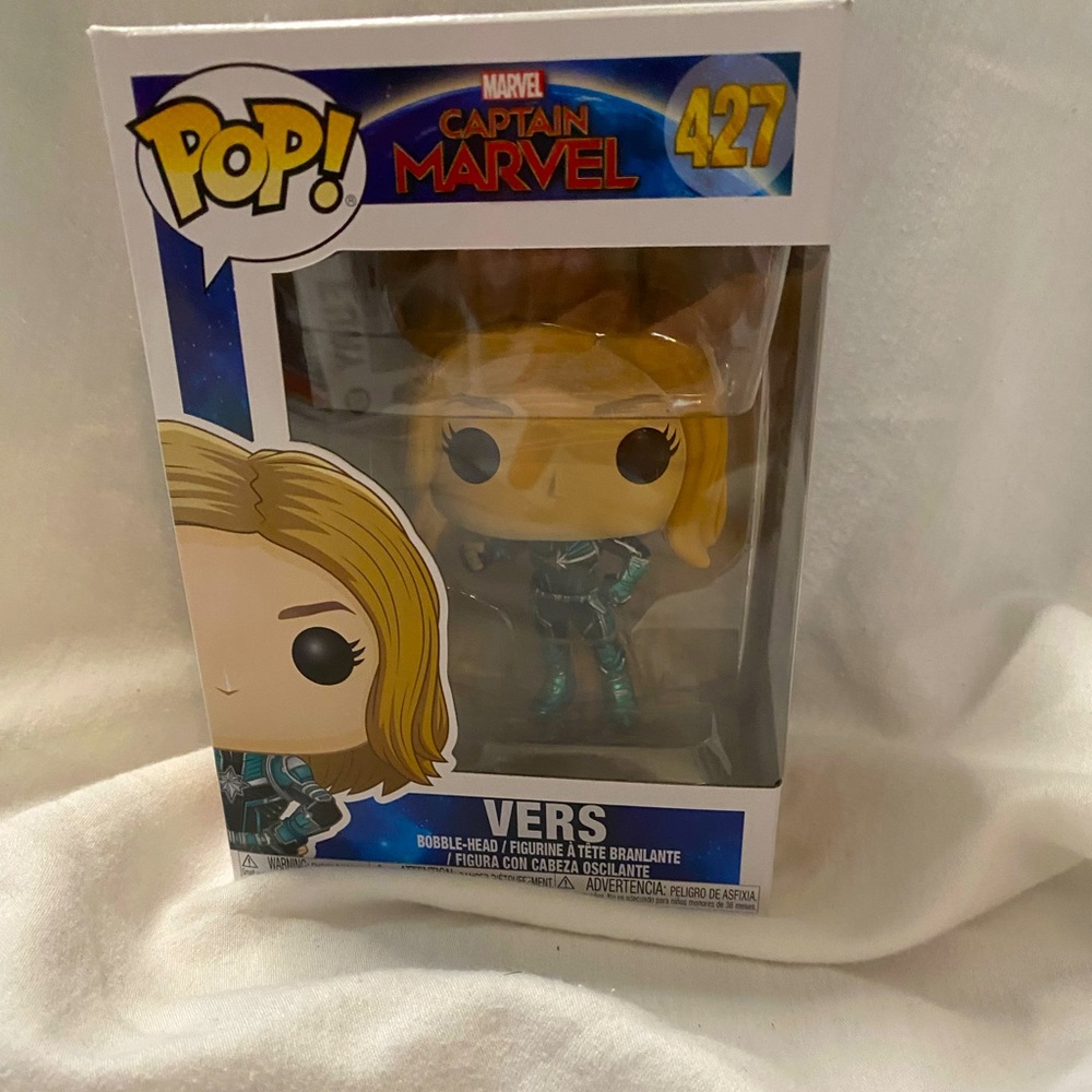 Captain Marvel and Spider-Woman Funko pop figures